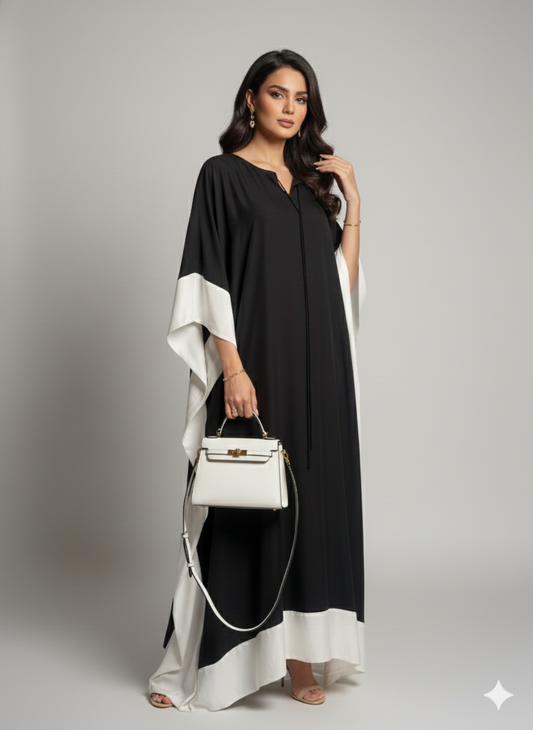 عباية حرير انسيابي سوداء بحواف بيضاء