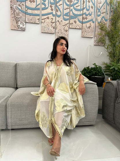 جلابية قماش شفاف عاجي بتطريز ذهبي