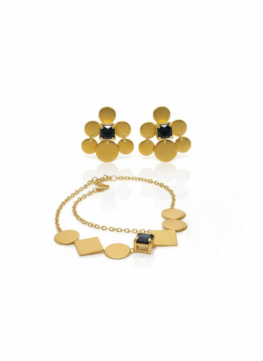 طقم ذهبي هندسي بأحجار داكنة