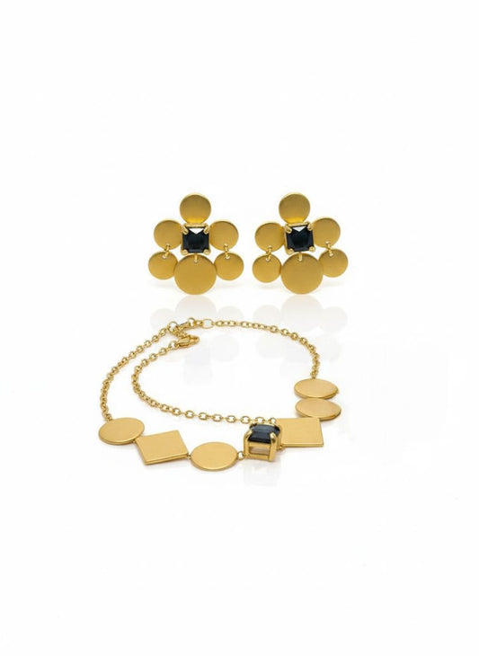 طقم ذهبي هندسي بأحجار داكنة
