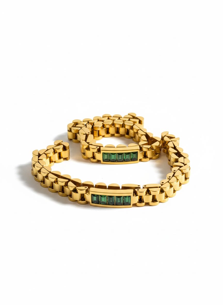 سوار معدني ذهبي بأحجار خضراء